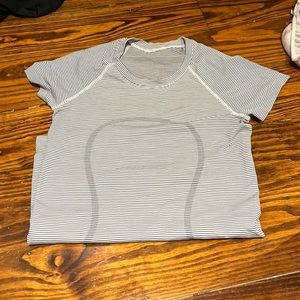 Black and white lululemon swiftly tech shirtsleeve size 4